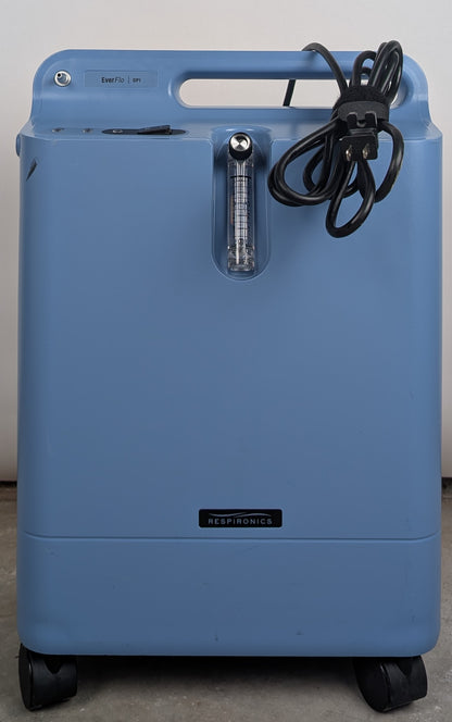 Blue oxygen concentrator with wheels on a gray background