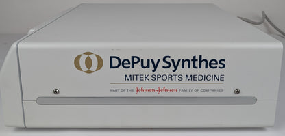 DePuy Synthes Mitek Sports Medicine device with Johnson & Johnson branding on a white background